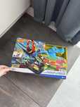 Hot Wheels City Pętla tor T-Rexa HXK42 kolejka autka dinozaury zabawka