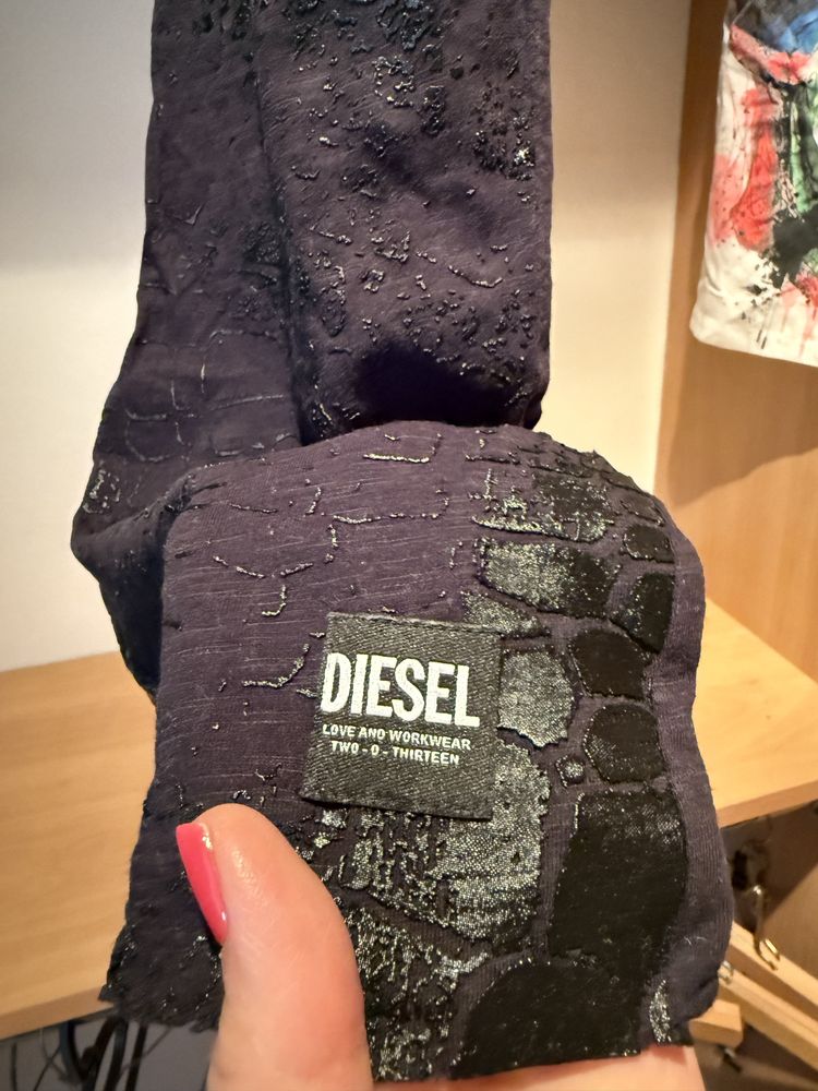 Damska koszulka lub krótka sukienka marki Diesel