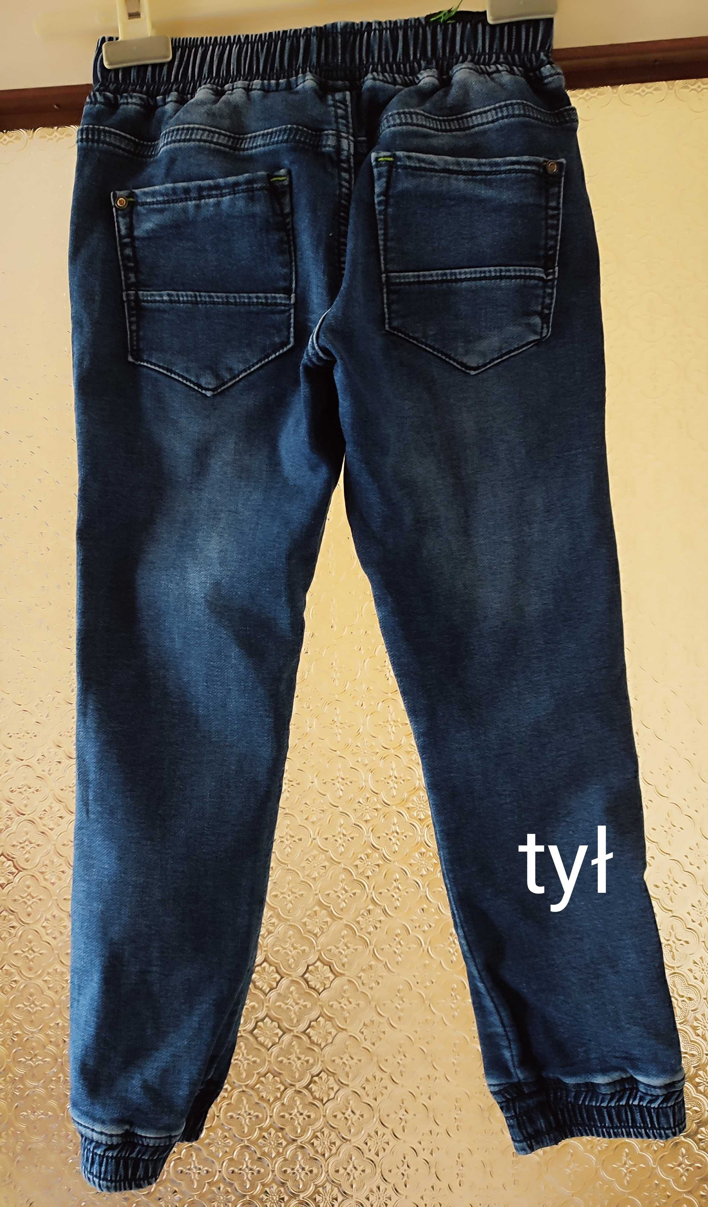 Spodnie dżinsowe chłopięce  bajeranckie w idealnym stanie rozm 122/128
