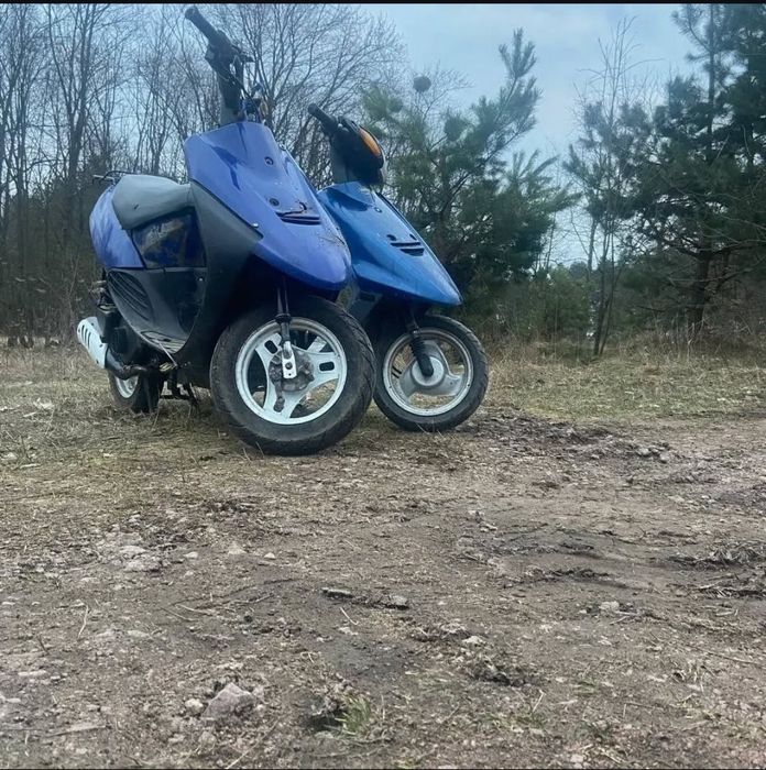 Скутер Сузукі сепія