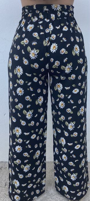 Calças fluídas de senhora