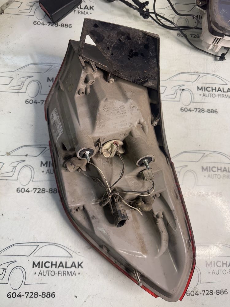 Opel Astra J IV kombi Lampa lewa tylna