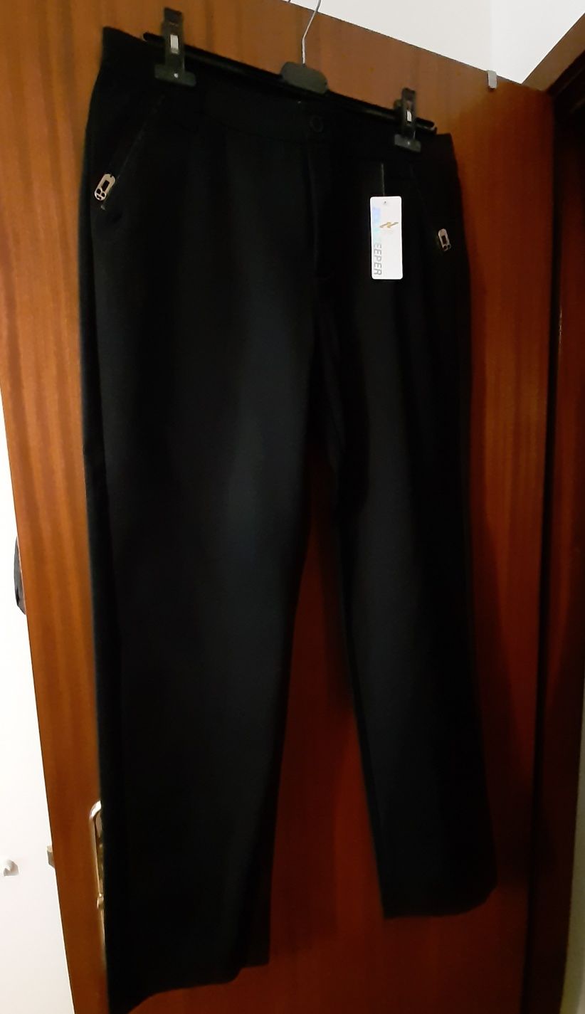 Calça preta modelo clássico ( novas) tam.xxl mas vestem pouco 10€