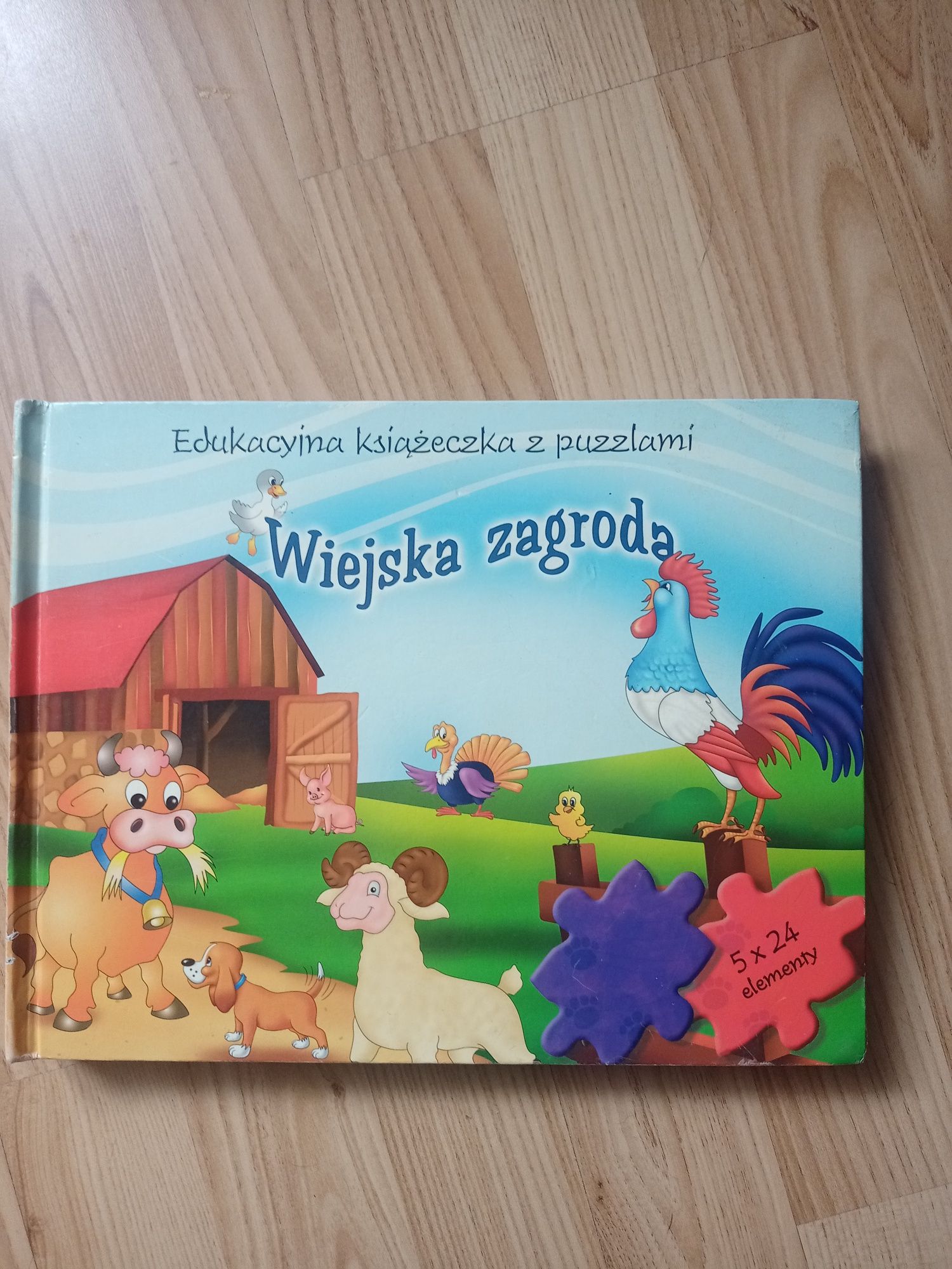 Książka z puzzlami i wierszykami dla dziecka