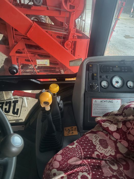 JCB-4CX екскаватор навантажувач