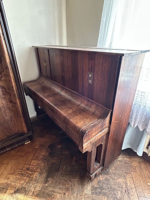 Pianino uzuwane Neufeld