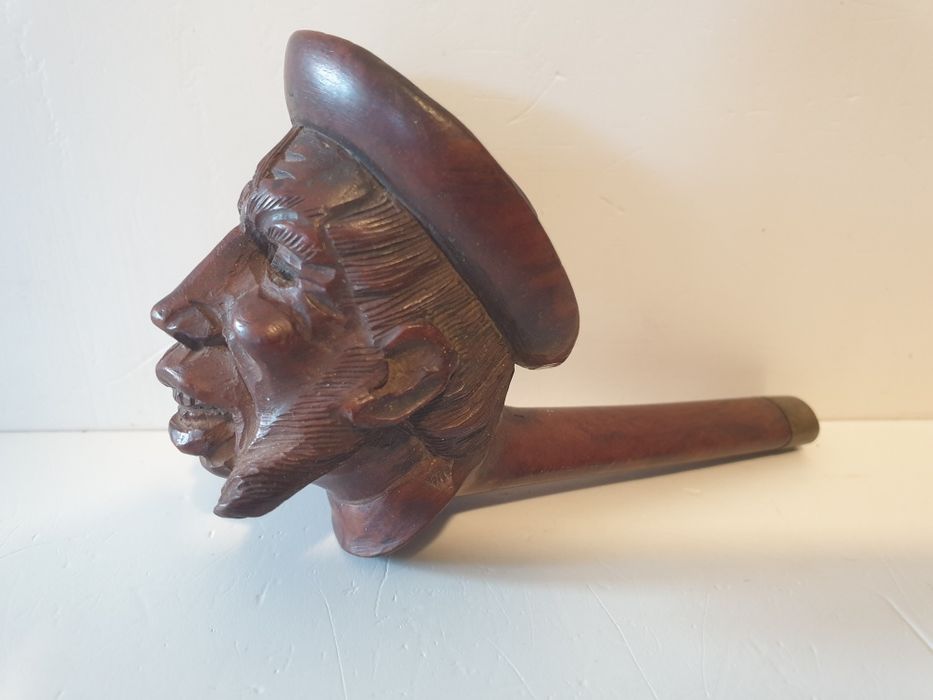 Antiga cabeça de um cachimbo americano -Farmers head