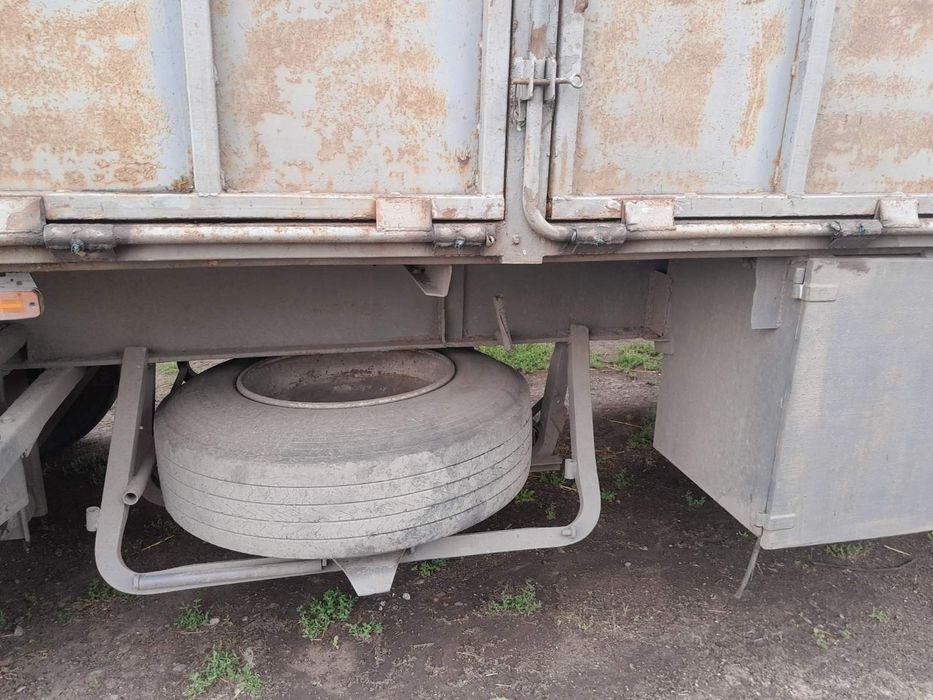 Полуприцеп МАЗ серый