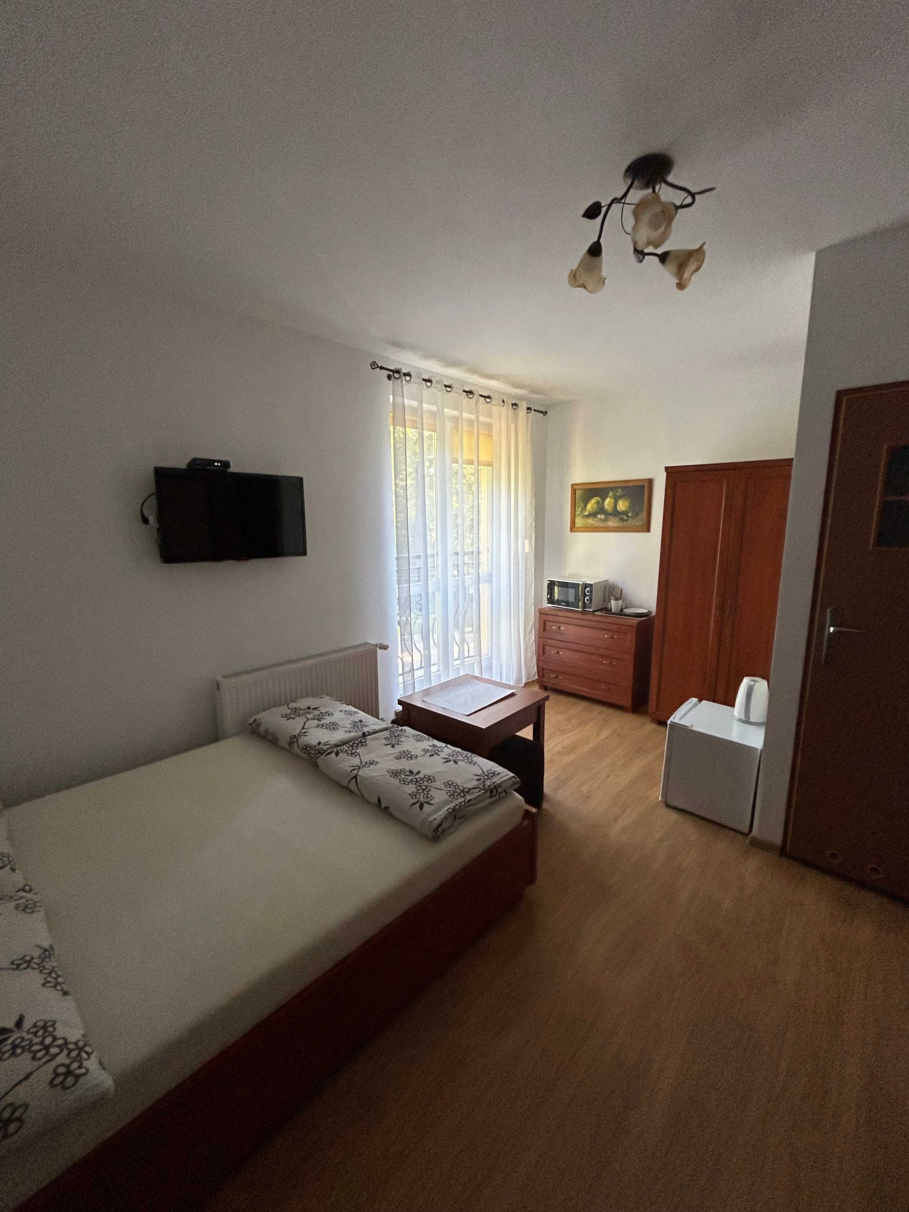 Pokoje Gościnne POD LASEM Pogorzelica
