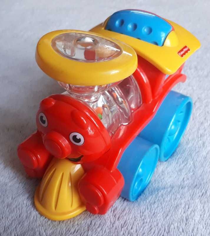 Kolorowa ciuchcia Fisher Price 3M+