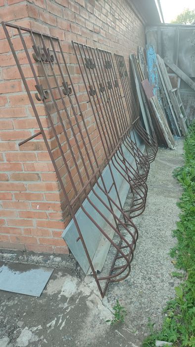 Решотки  (грати) кованые  на  окона