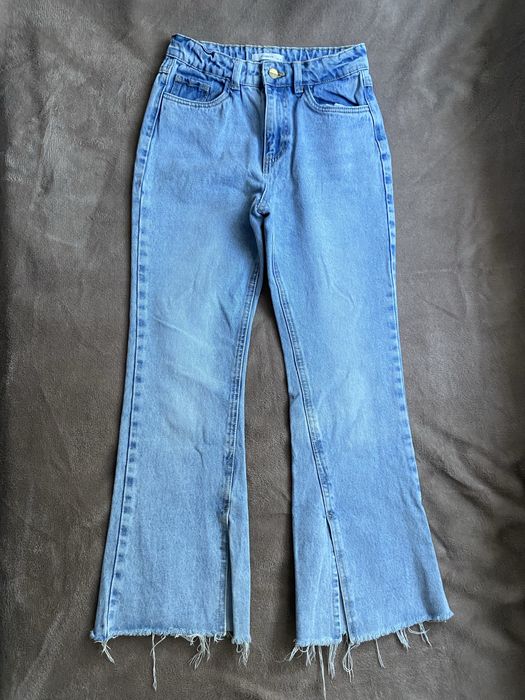 Spodnie dzwony szerokie szarpane nogawki Reserved 152cm jeansy