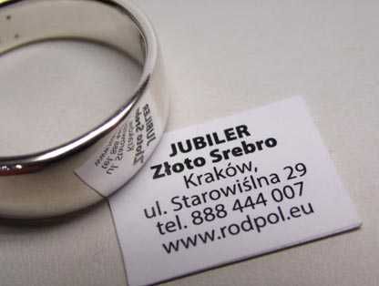Srebrna gładka obrączka  R.32. szerokość 6,7 - 9,2 mm.
