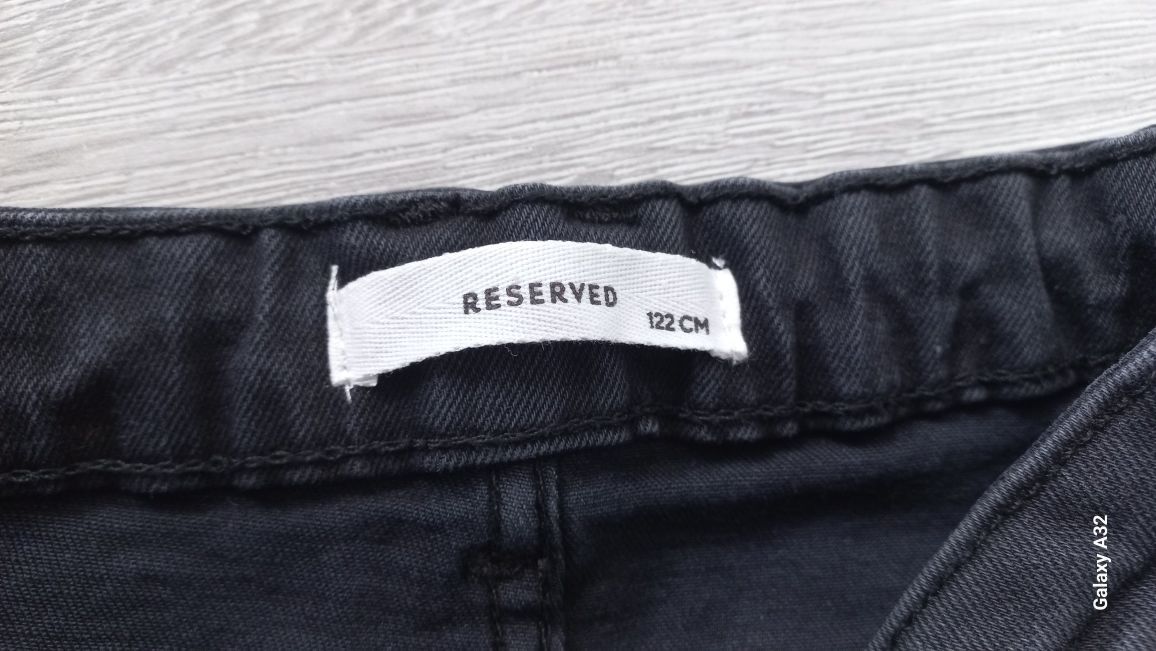 Reserved Spodnie jeansowe 122 flare rozszerzane dzwony rozcięcie jeans