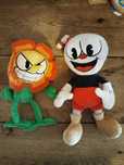 Filuś i Rusłan Rosiczkoff. Cuphead  i Cagney Carnation maskotki