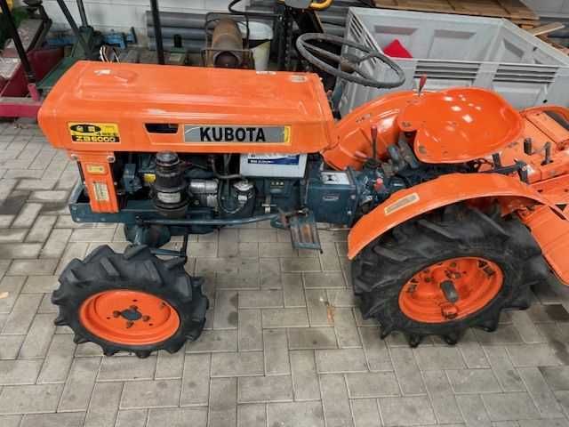 KUBOTA ZB 6000 z glebogryzarką . sprowadzona  napęd na 4 koła