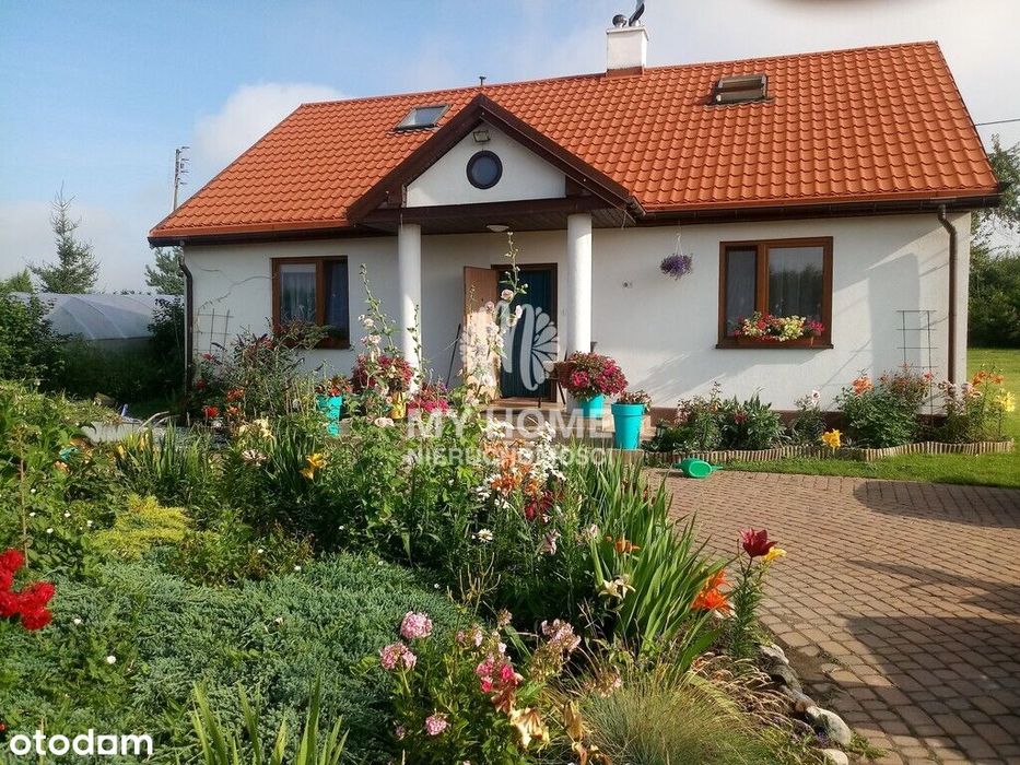 Przestronny dom z kominkiem na dużej działce!