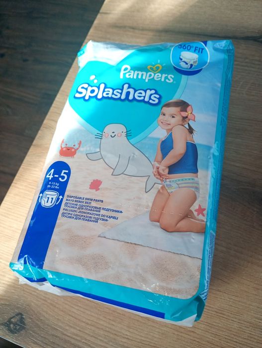 3 paczki pielucho majtek i paczka pieluchomajtek do basenu