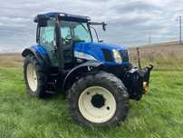 Ciagnik New holland Ts 135 A john deere case