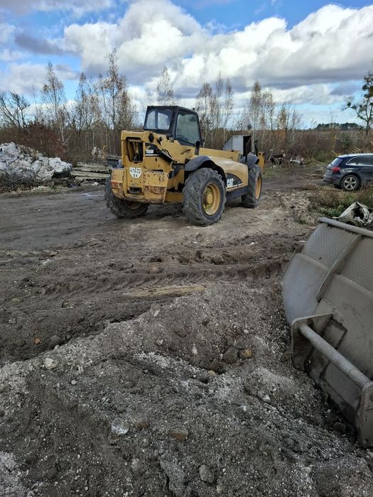 Навантажувач маніту, катерпілер джісібі