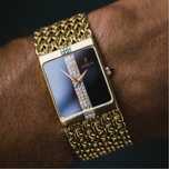 Relogio Corum em ouro amarelo 18k e mostrador Onyx e Diamantes