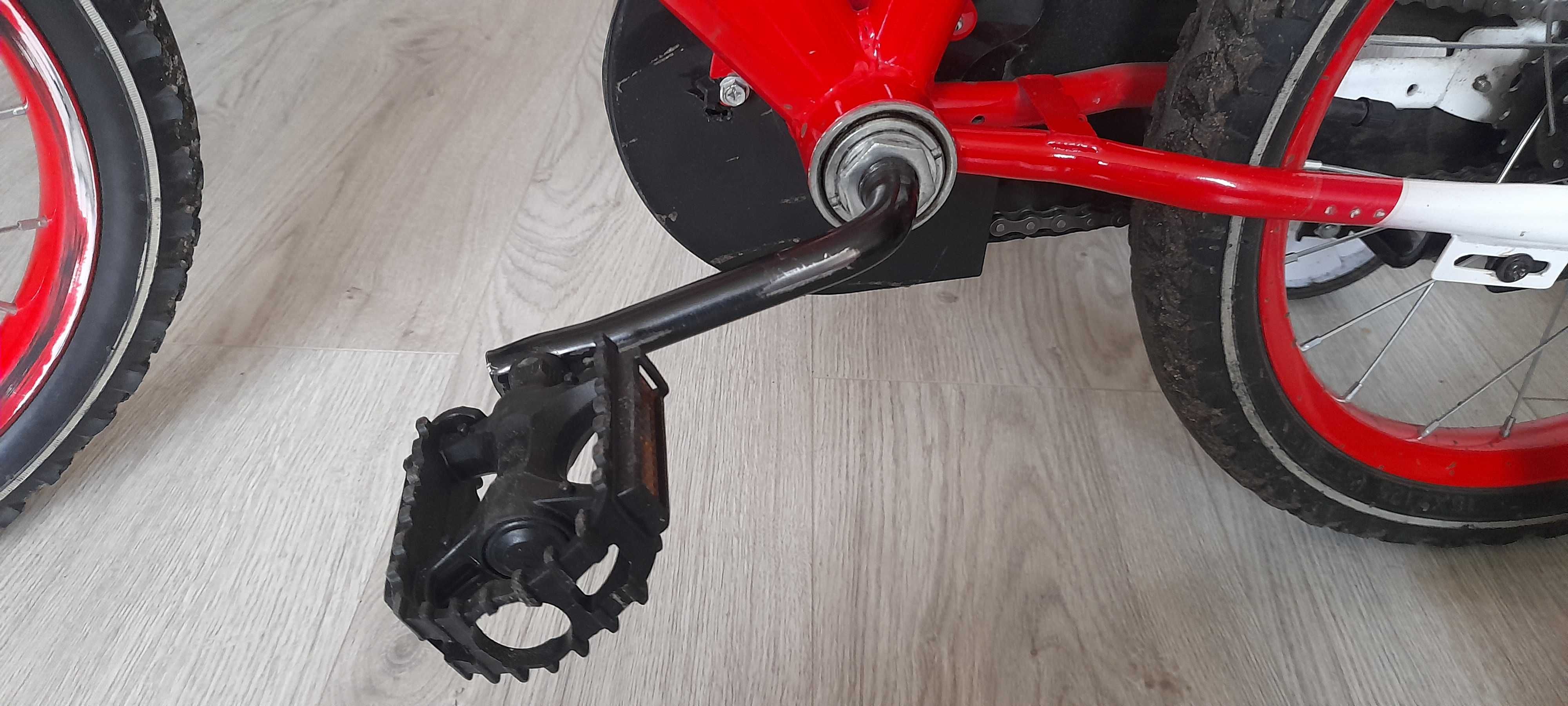 Rower dzieciecy z bocznymi kółkami s