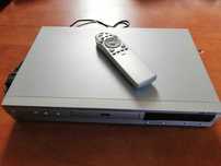 Odtwarzacz DVD Opti DVD-1010 z pilotem. Różne złącza i wyjścia.