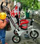 Трёхколёсный велосипед с родительской ручкой