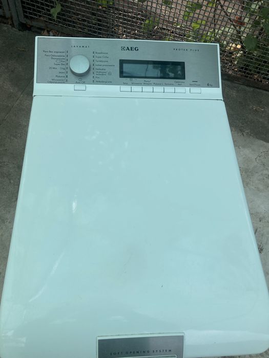 Продам стиральную машину  Aeg вертикальной   загрузкой