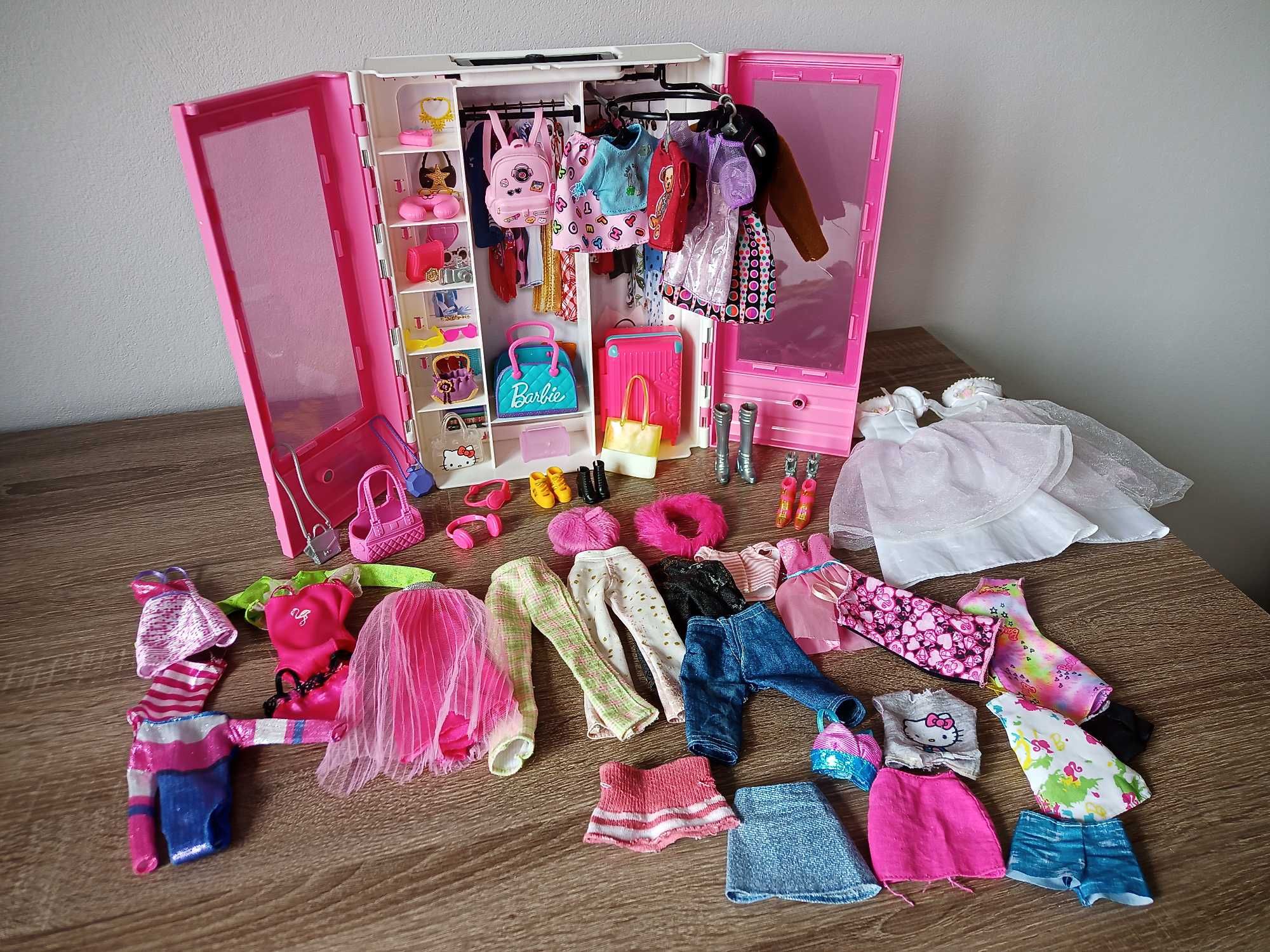 Dom lalki Barbie Dreamhouse, samolot, karetka, auto, cukiernia i in.