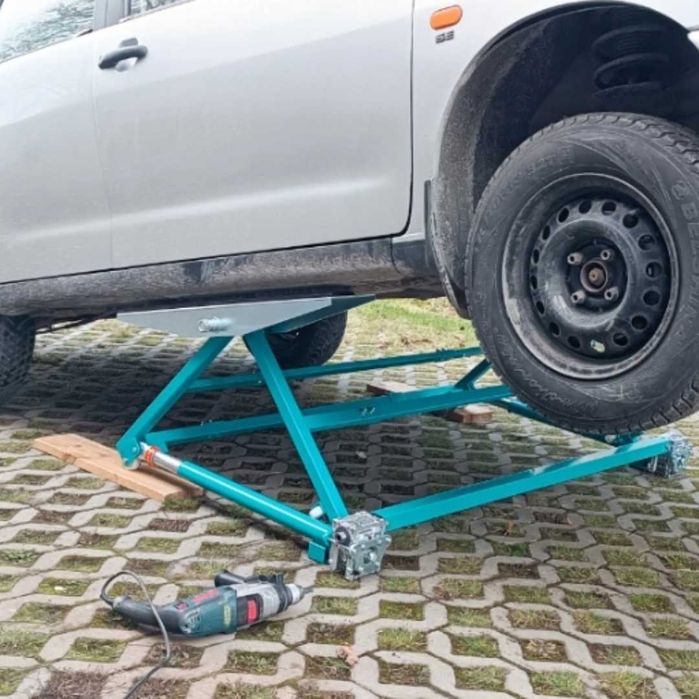 podnośnik nożycowy mobilny podnośnik wahadłowy hydrauliczny do 2000 kg