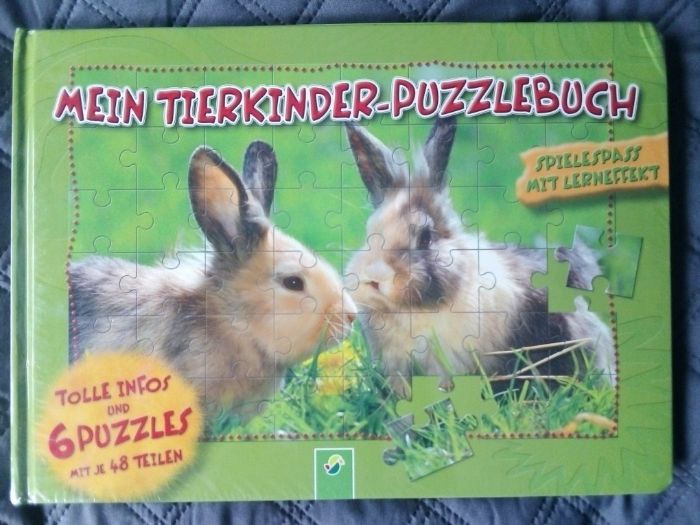 Książka z puzzlami w języku niemieckim