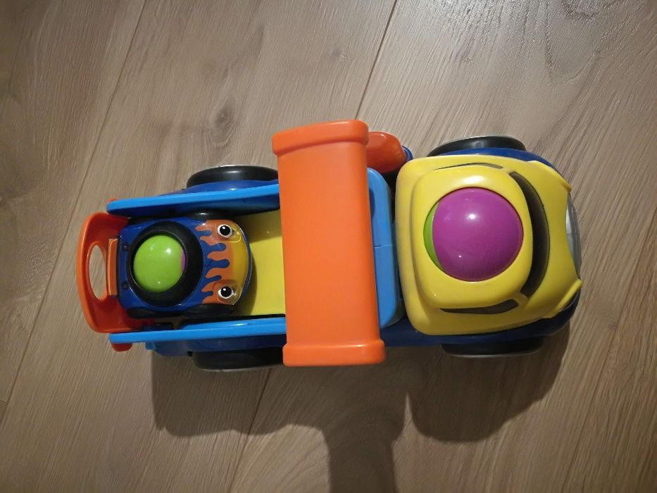 Rozkołysana ciężarówka laweta Fisher Price