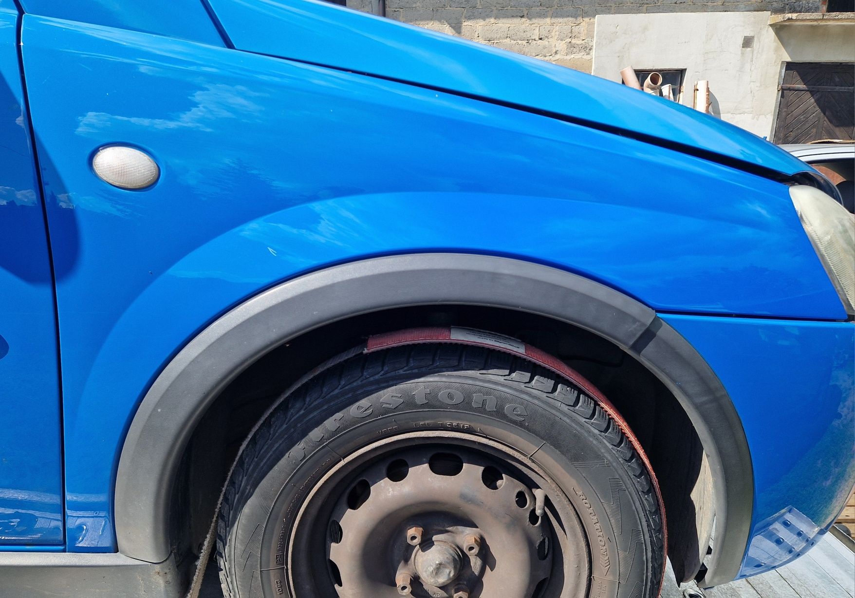 Blotnik Przód Opel Corsa C  Z20a
