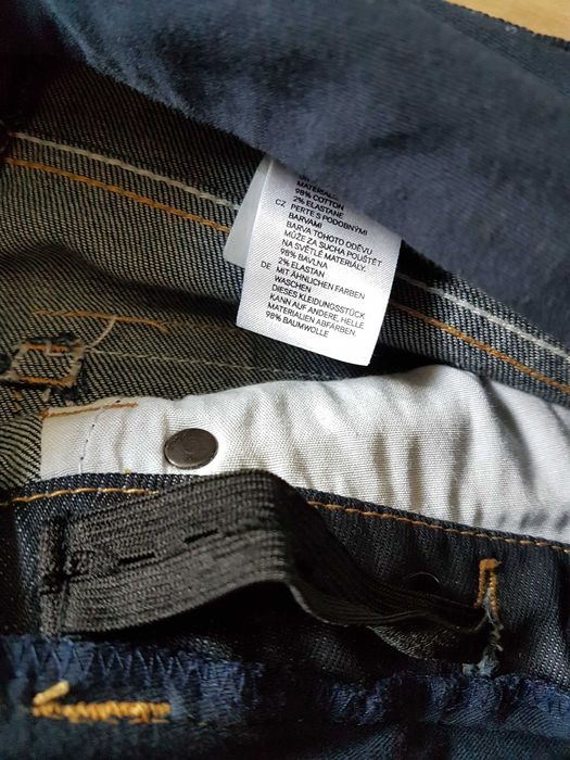 Granatowe bawełniane jeansy ciążowe H&M MAMA roz. 36
