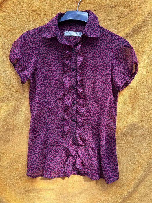 Blusa fúchsia leopardo. Como nova.