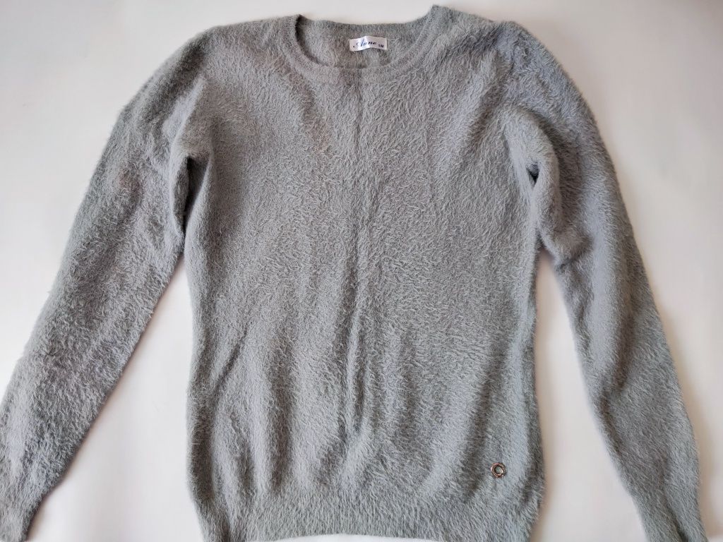 Розпродаж актуальних теплих світшотів светрів