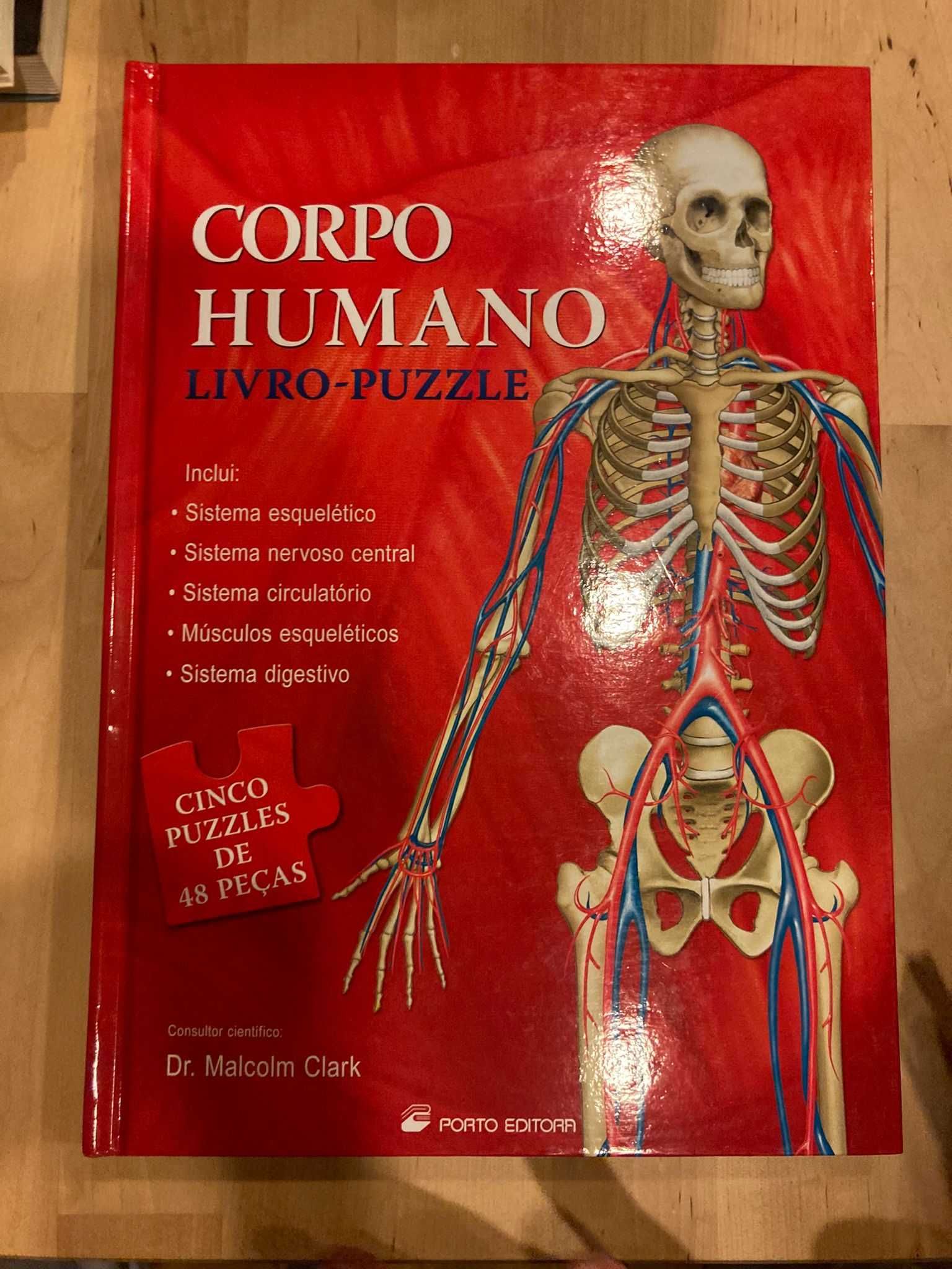 Livro puzzle anatomia corpo humano contem varios puzzles por abrirl.