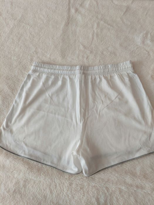 Calções brancos da Benetton 13-14 anos
