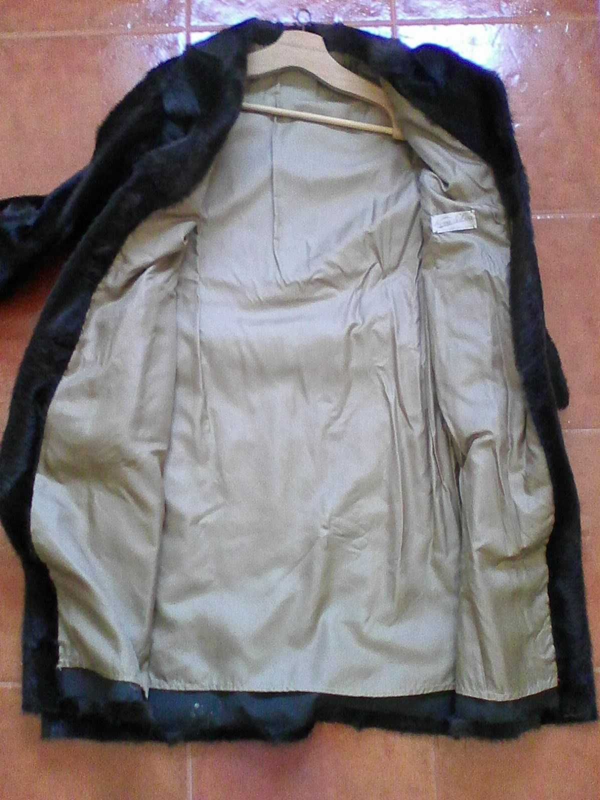 Casaco antigo pelo Nova Lisboa