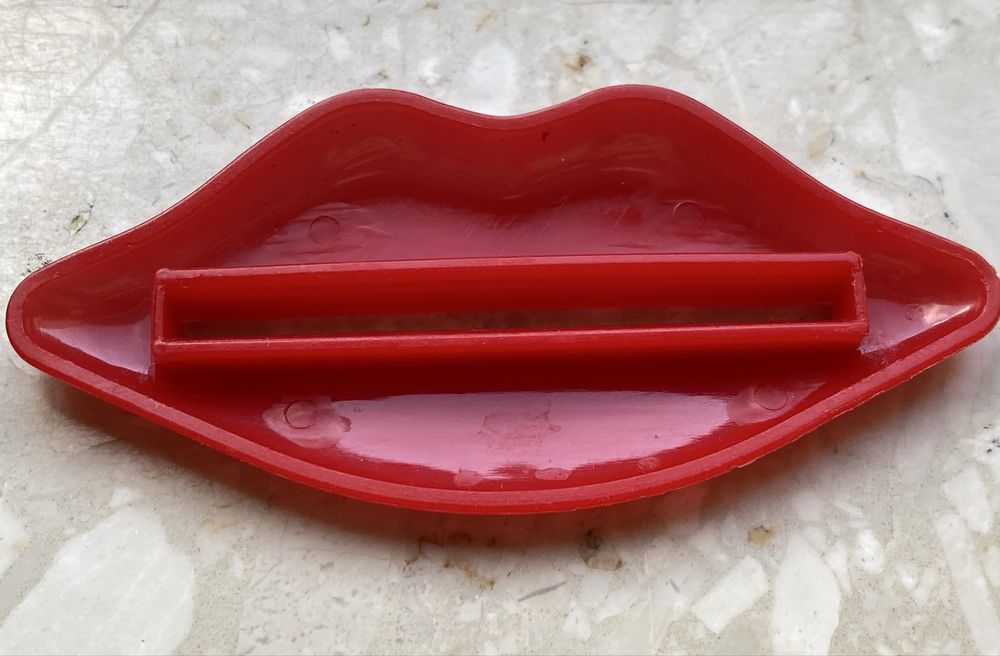 Wyciskacz Usta do pasty do zębów / do tubek z kremem