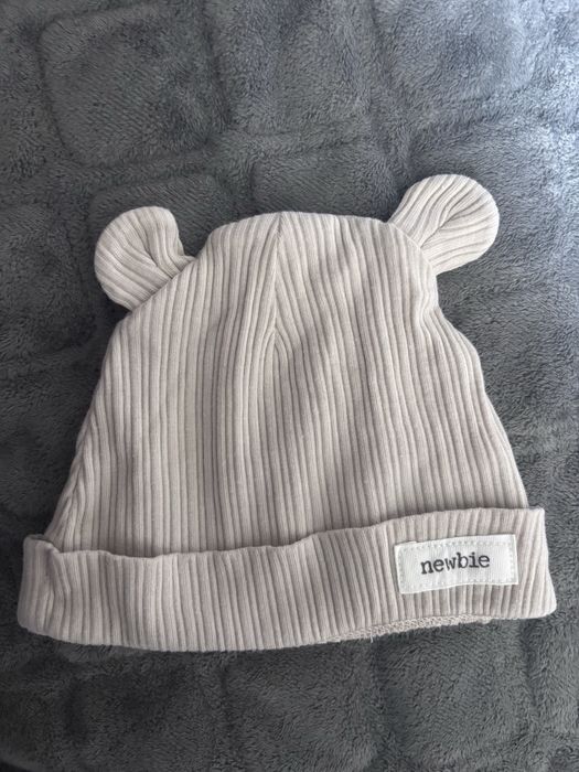 Дитячі шапочки на новонародженого