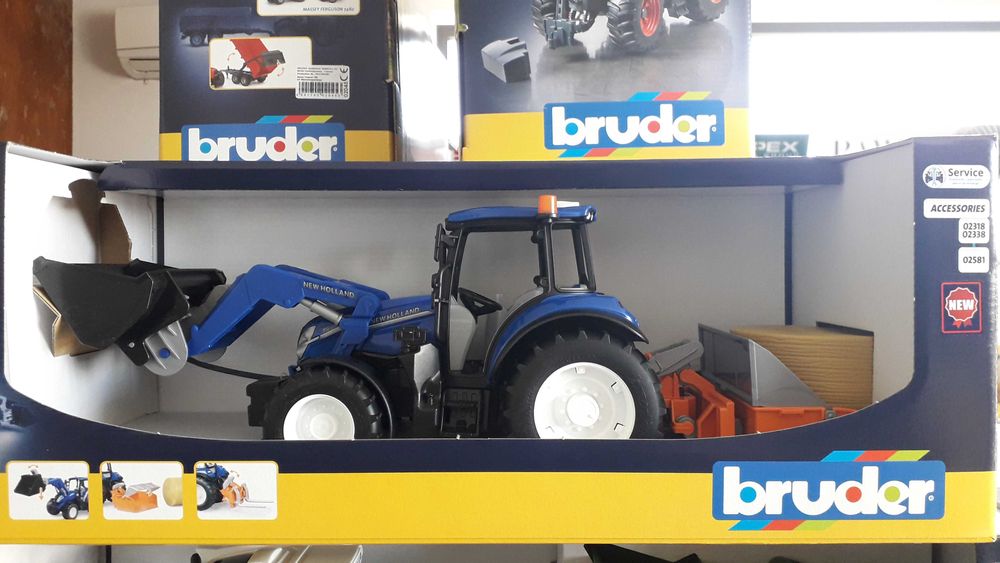 Bruder zabawka Traktor New Holland TS120 z łado+akcesoria
