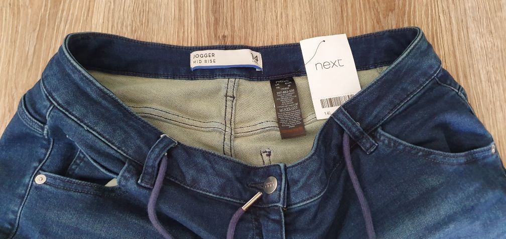 Nowe spodnie NEXT  joggery rozmiar L 42 kolor granatowy