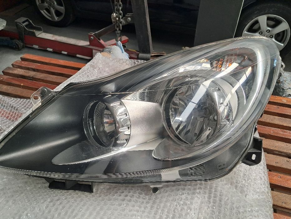 Farol esquerdo Opel Corsa D