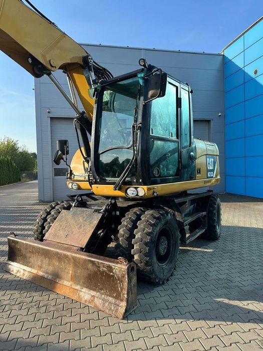 Caterpillar 313D  CAT 313 d super stan mały przebieg