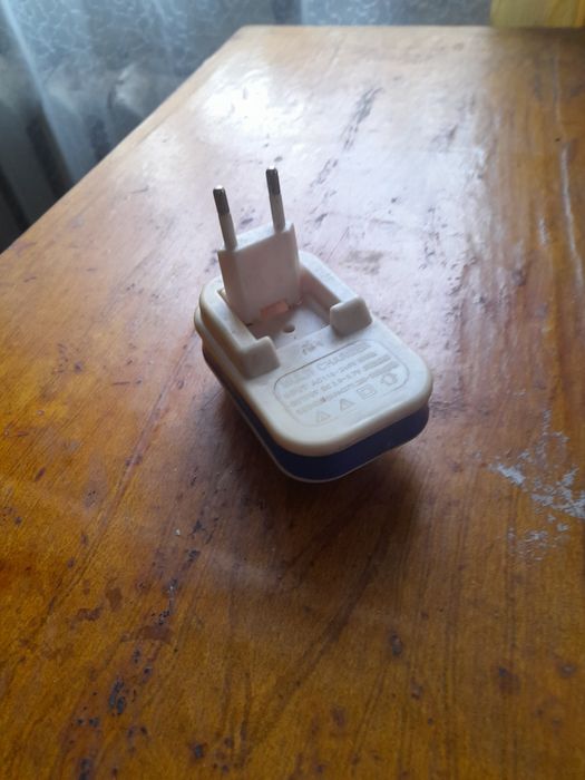 Зарядное уст-во для телефонных батарей