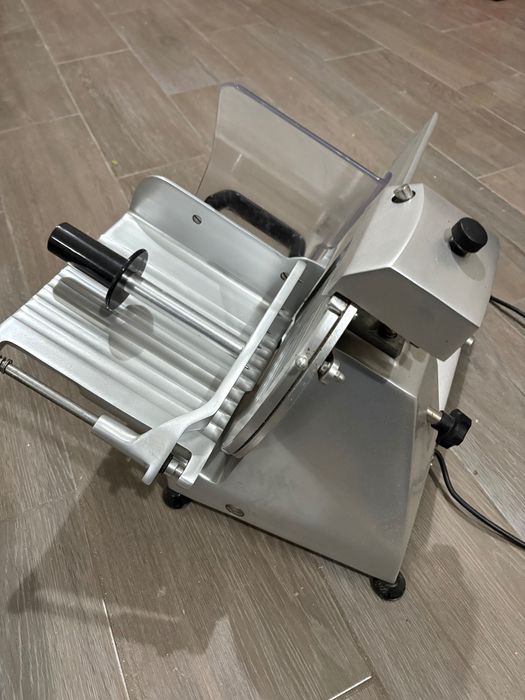 Máquina de cortar carnes