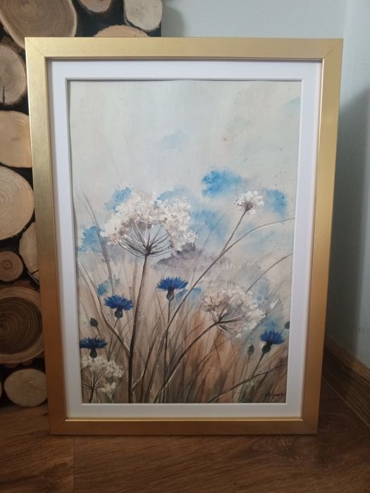 Akwarela w złotej ramie