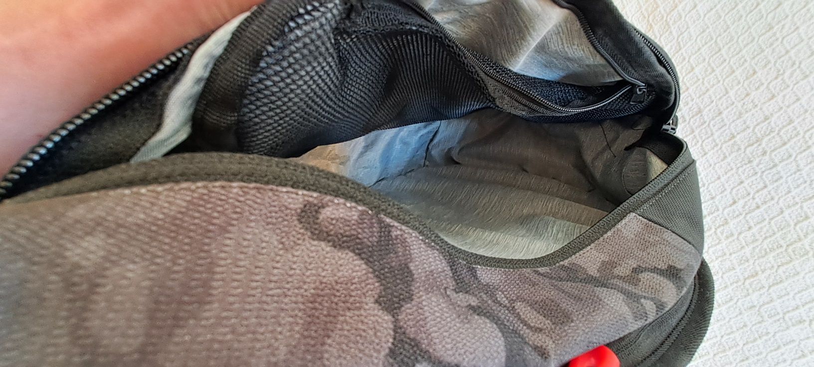 Mochila tira colo nova